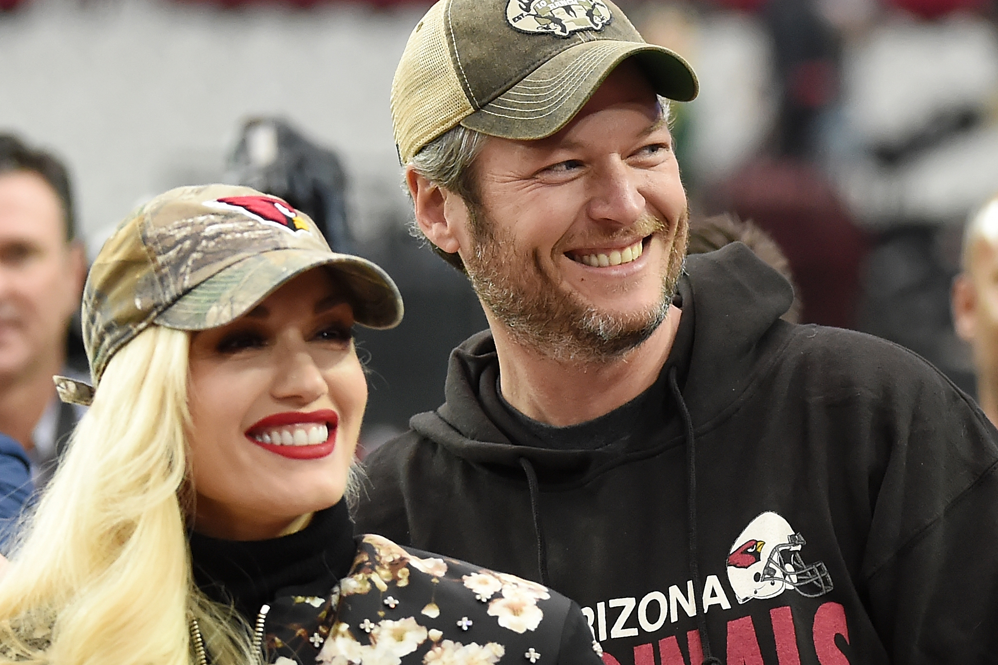 Gwen Stefani and Blake Shelton watch an NFL game in December 2015