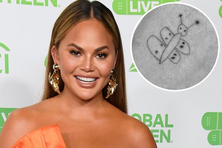 Chrissy Teigen and her butterfly tattoo