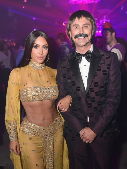 Km Kardashian and Jonathan "Foodgod" Cheban dressed as Sonny and Cher