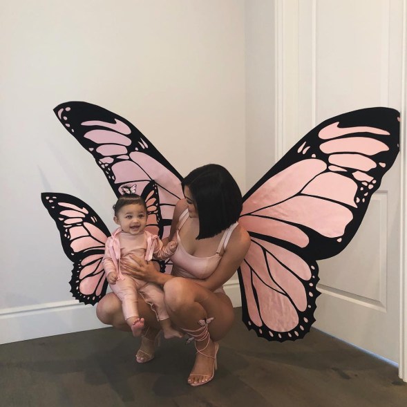 Kylie Jenner and Stormi Webster in matching butterfly costumes