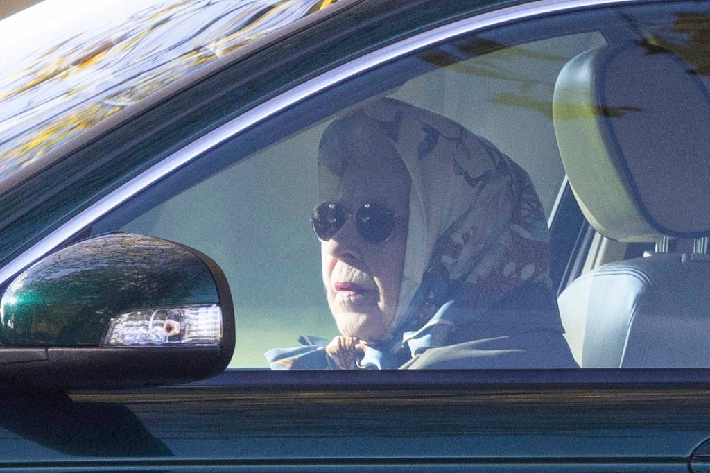 Queen Elizabeth was spotted behind the driver's wheel after spending the night at the hospital due to a health scare.