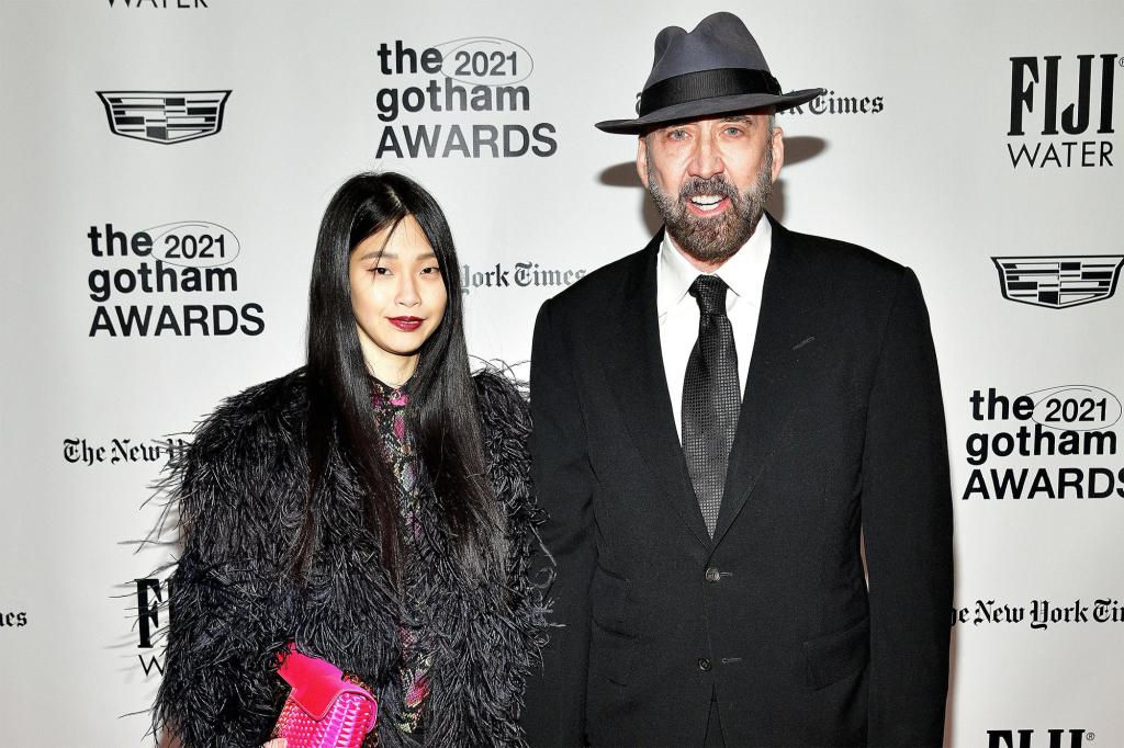 Nicolas Cage and his wife Riko Shibata at a red carpet.