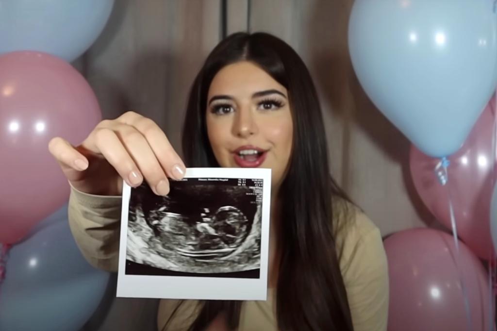 Sophia Grace Brownlee holding photo of ultrasound