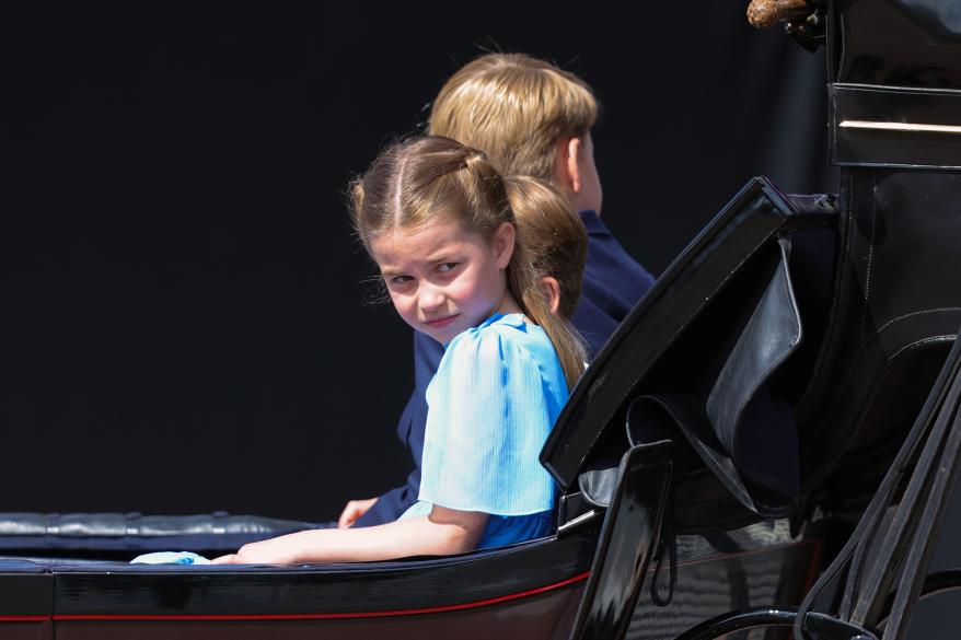 Prince George, Princess Charlotte and Prince Louis sitting in a carriage at Trooping the Colour.