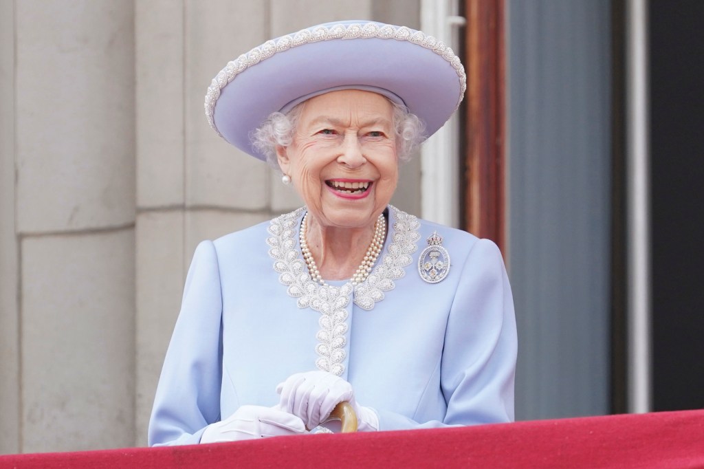 Queen Elizabeth II smiling at Trooping the Colour 2022.