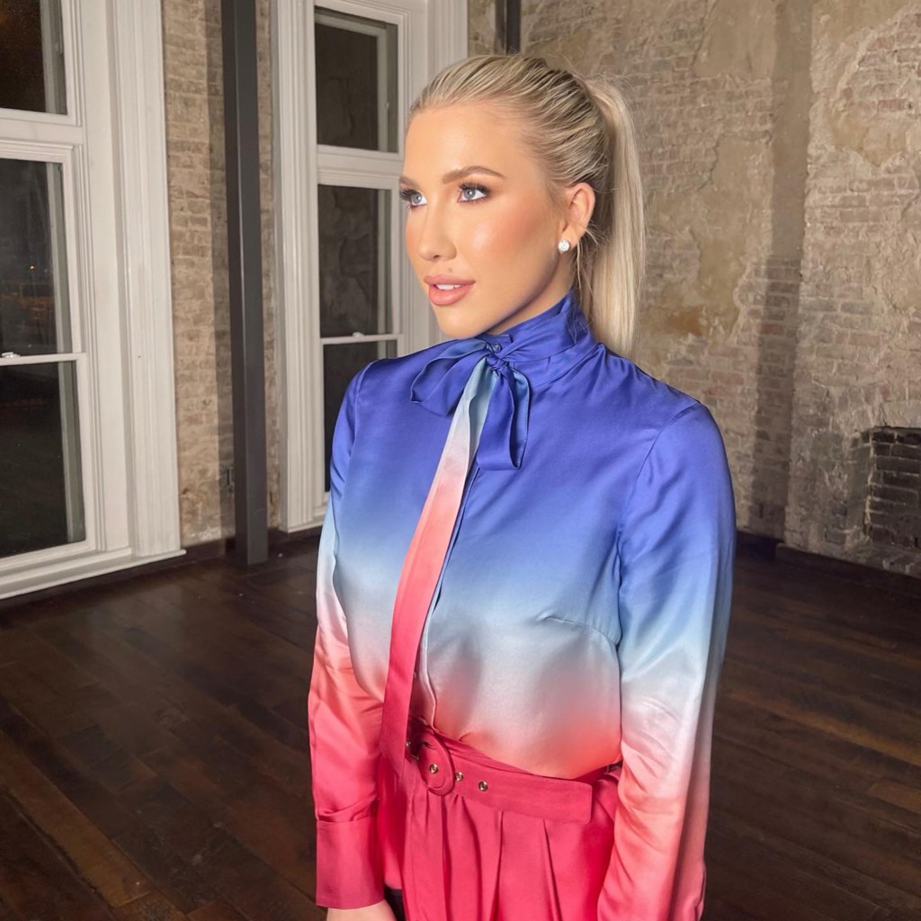 Savannah Chrisley wearing a multicolored jacket.