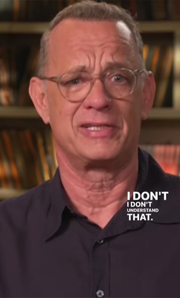 A screenshot of Tom Hanks talking during an interview.