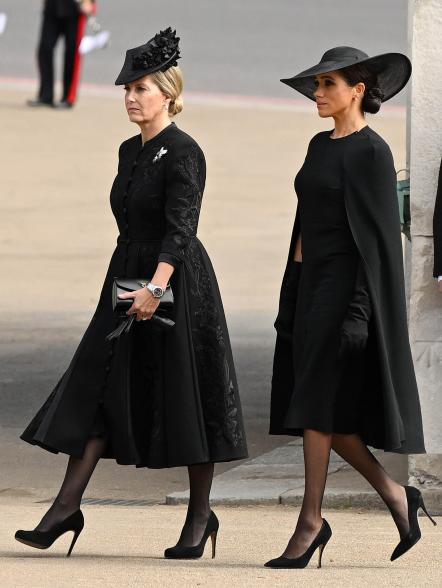 Meghan Markle and Sophie, Countess of Wessex, walking at the Queen's funeral.