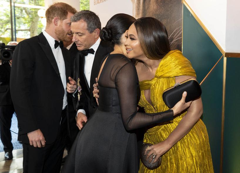 Meghan Markle and Beyoncé hugging.