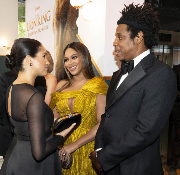 Meghan Markle, Jay-Z and Beyoncé talking.