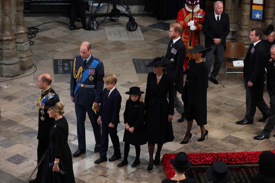 The royal family walking together at Queen Elizabeth II's funeral.