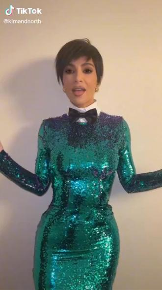 Kim Kardashian dressed up as Kris Jenner.