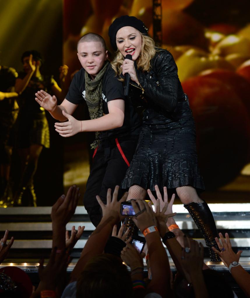 Madonna performs onstage with son Rocco