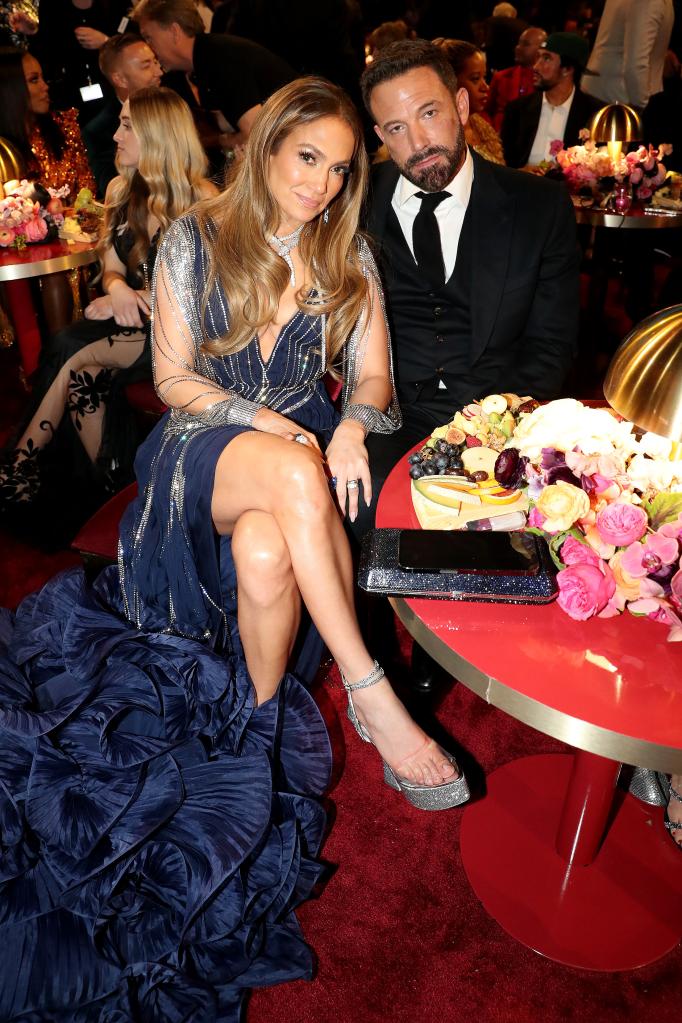 Ben Affleck and Jennifer Lopez sitting together at the 2023 Grammys.