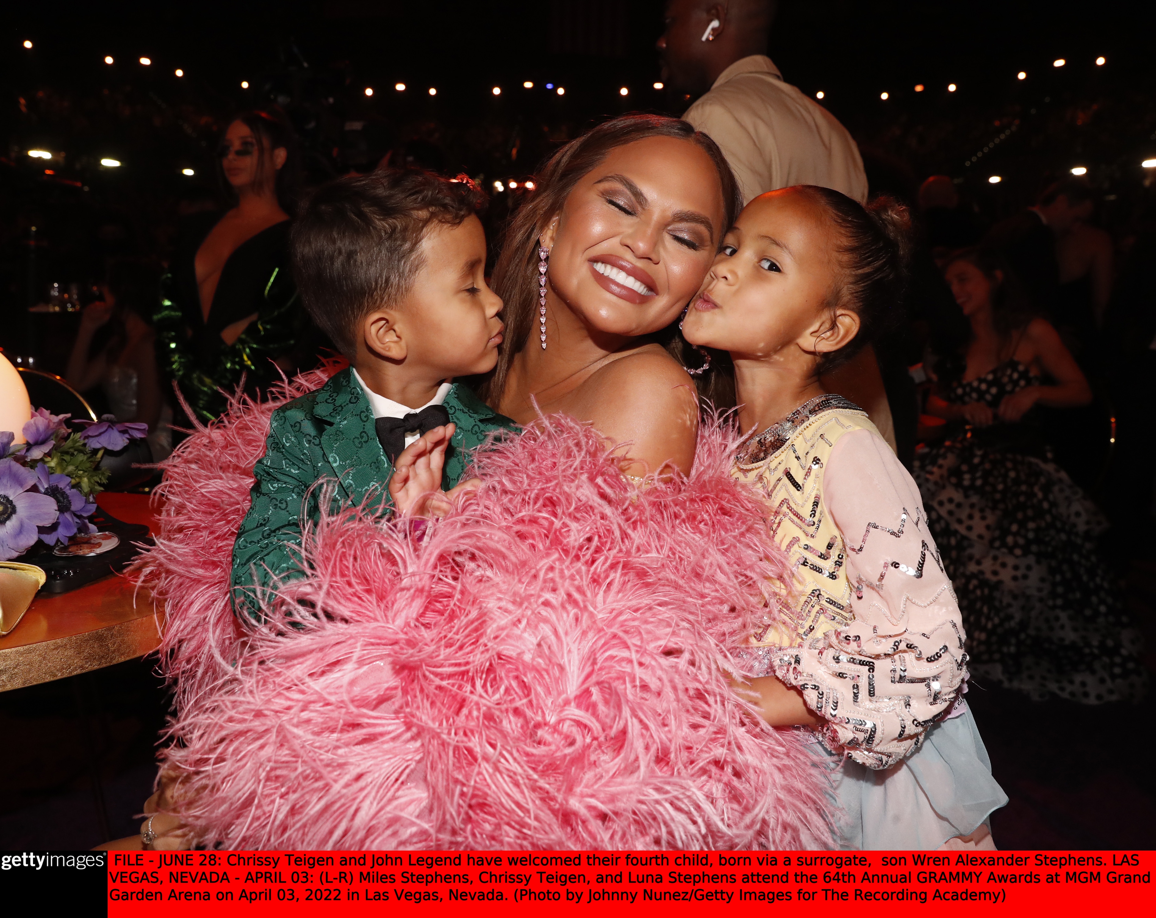 Chrissy Teigen with kids Luna and Miles.