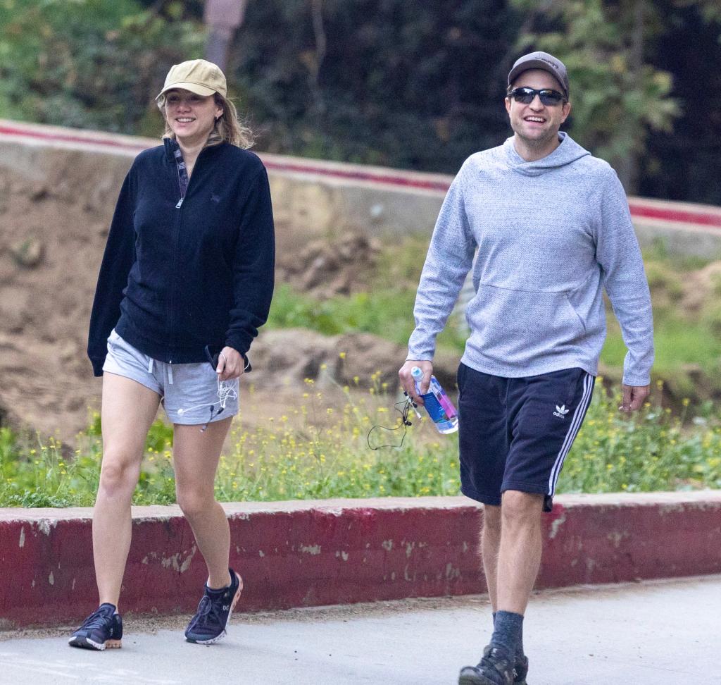 Robert Pattinson and Suki Waterhouse going for a hike.