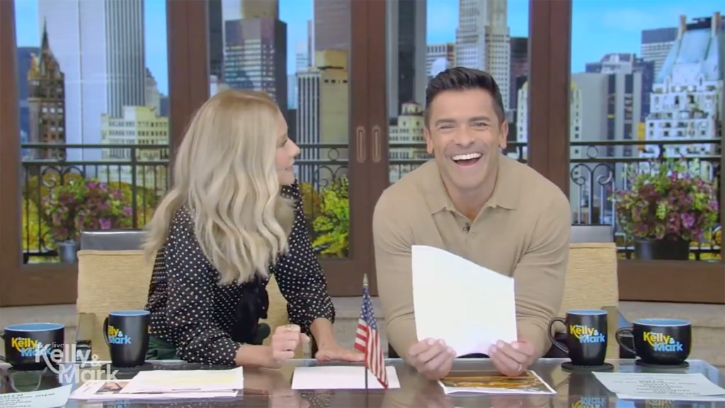 Kelly Ripa and Mark Consuelos talking on "Live"