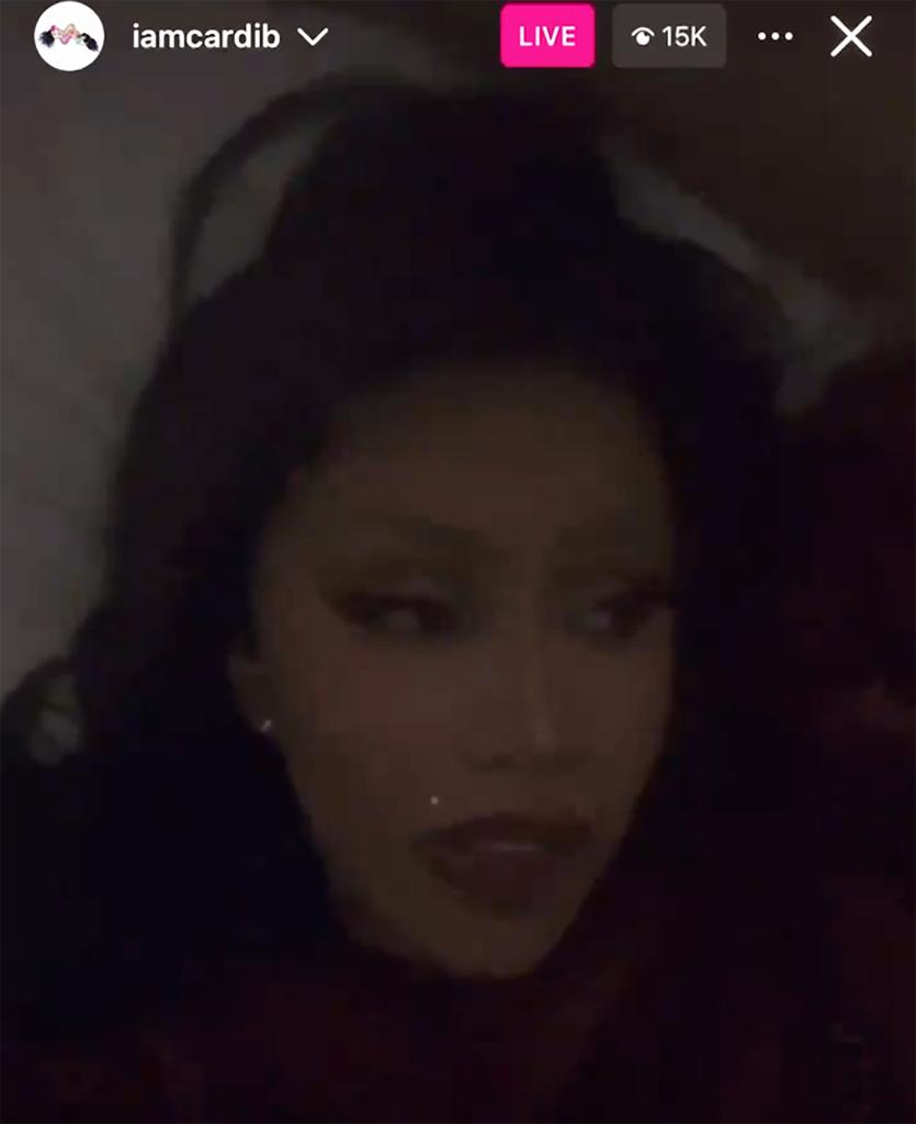 cardi b sitting in the dark on Instagram live