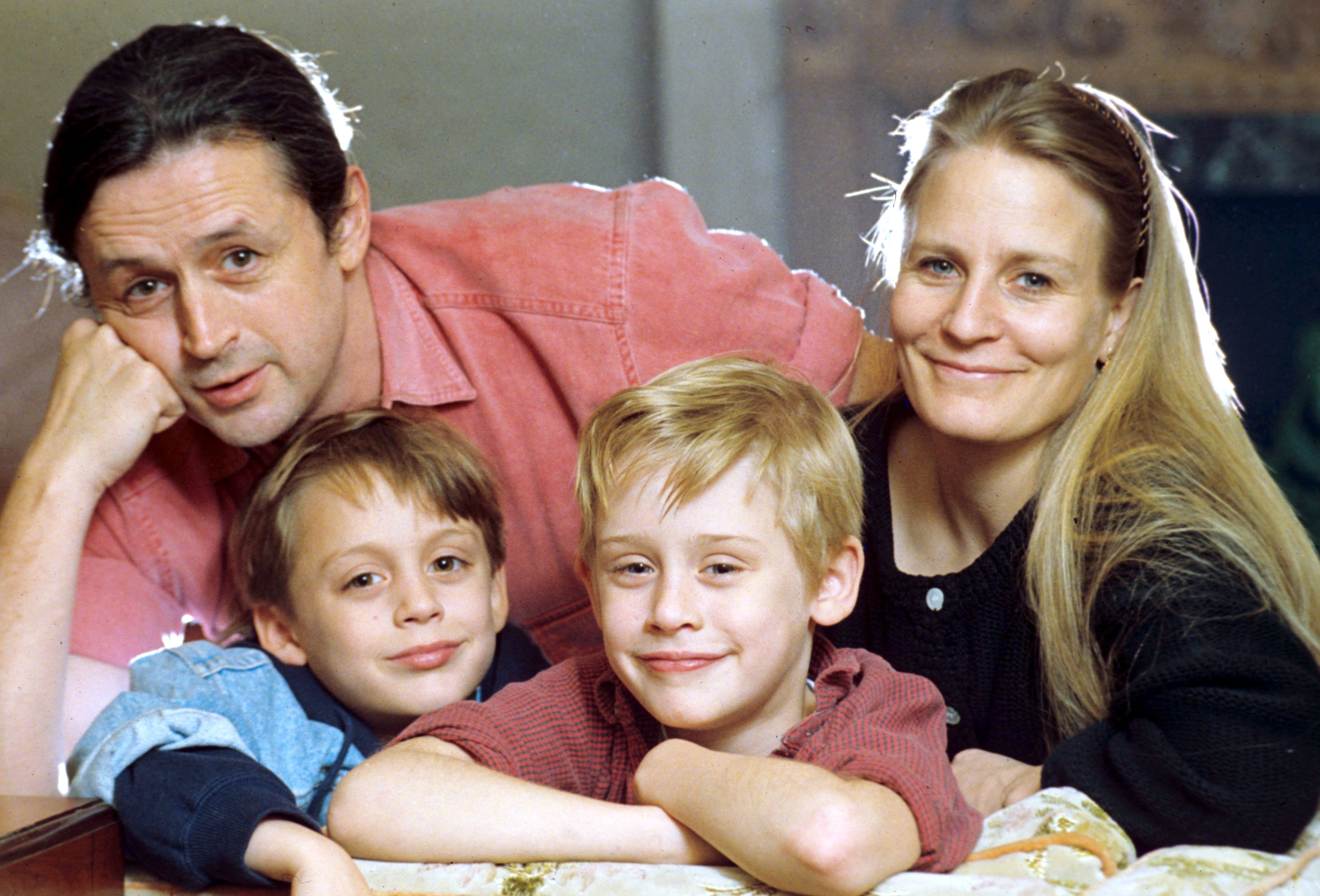 Patricia Brentrup, Kit Culkin, Macaulay Culkin and Kieran Culkin pose for photo.