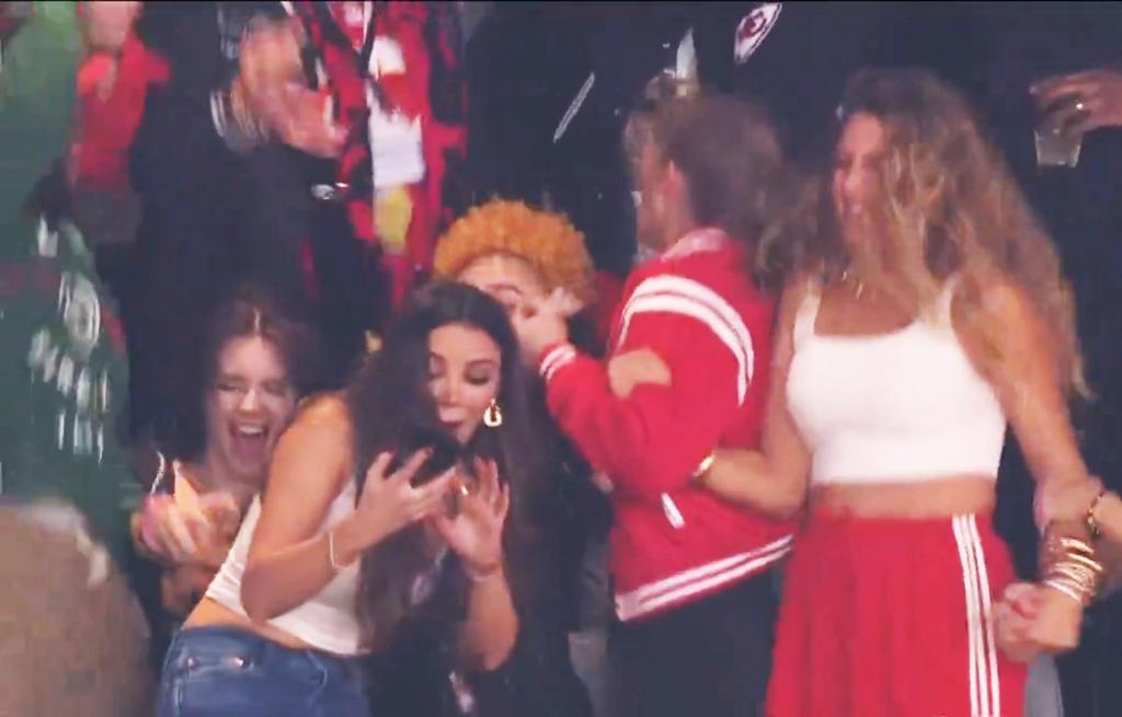 Lana Del Rey falls while celebrating Chiefs win.