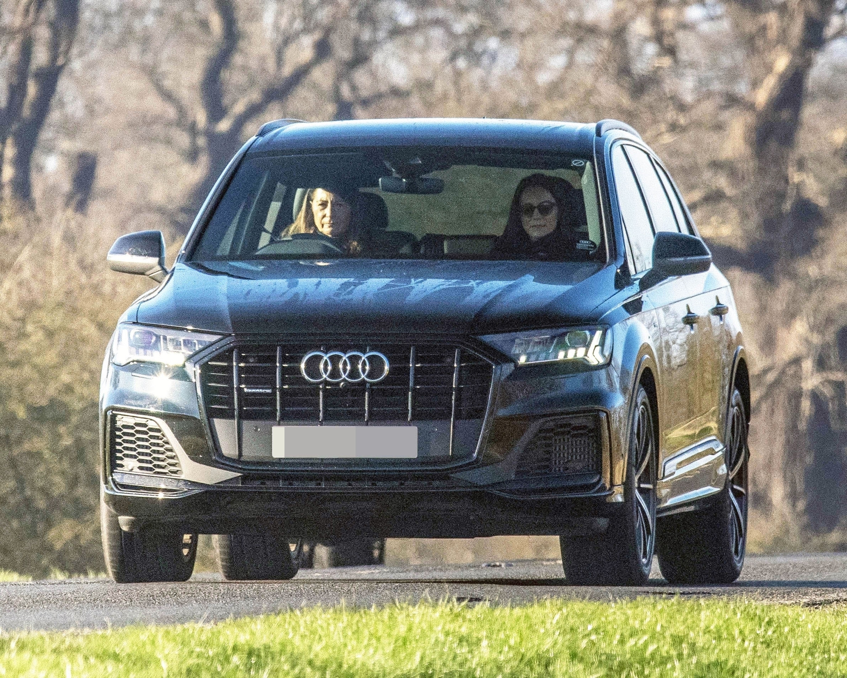 Kate Middleton and Carole Middleton sitting in a car