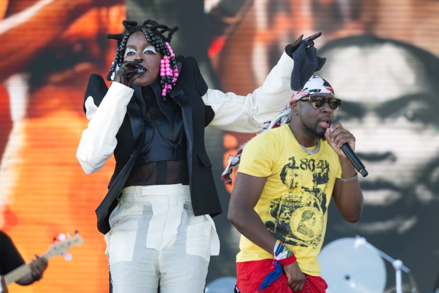 Singers Lauryn Hill and Wyclef Jean of The Fugees performs onstage during Weekend 2 - Day 3 of the Coachella Valley Music & Arts Festival at Empire Polo Club on April 21, 2024