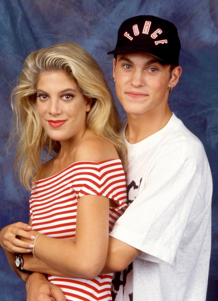 Tori Spelling and Brian Austin Green in a 199r press shot