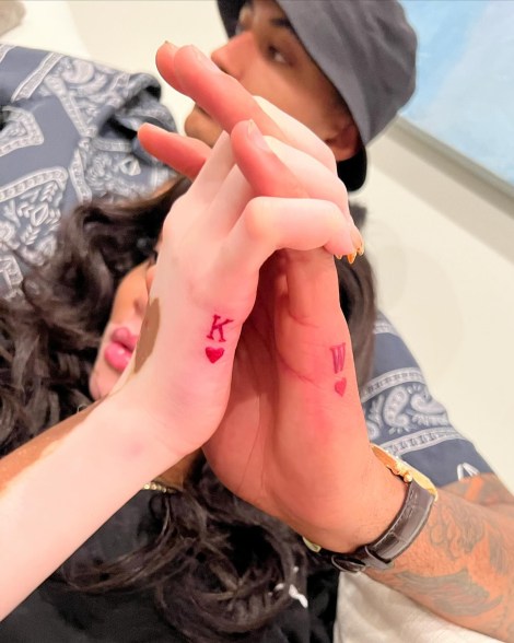 winnie harlow's hand interlaced in her boyfriend's