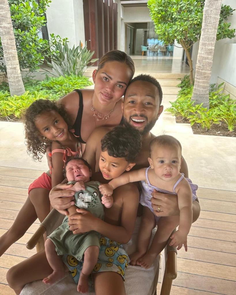 John Legend and Chrissy Teigen with their four kids