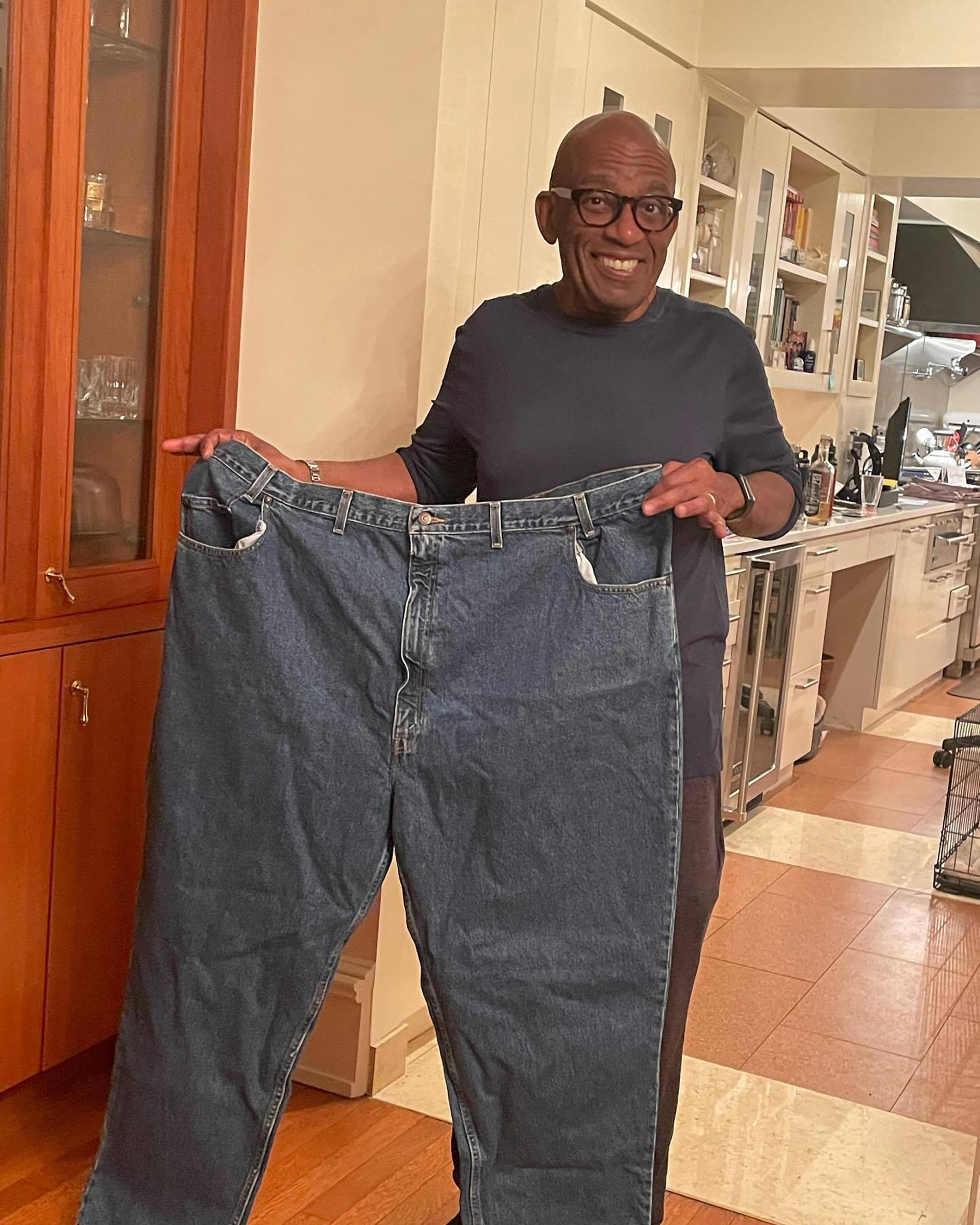 Al Roker holding pants