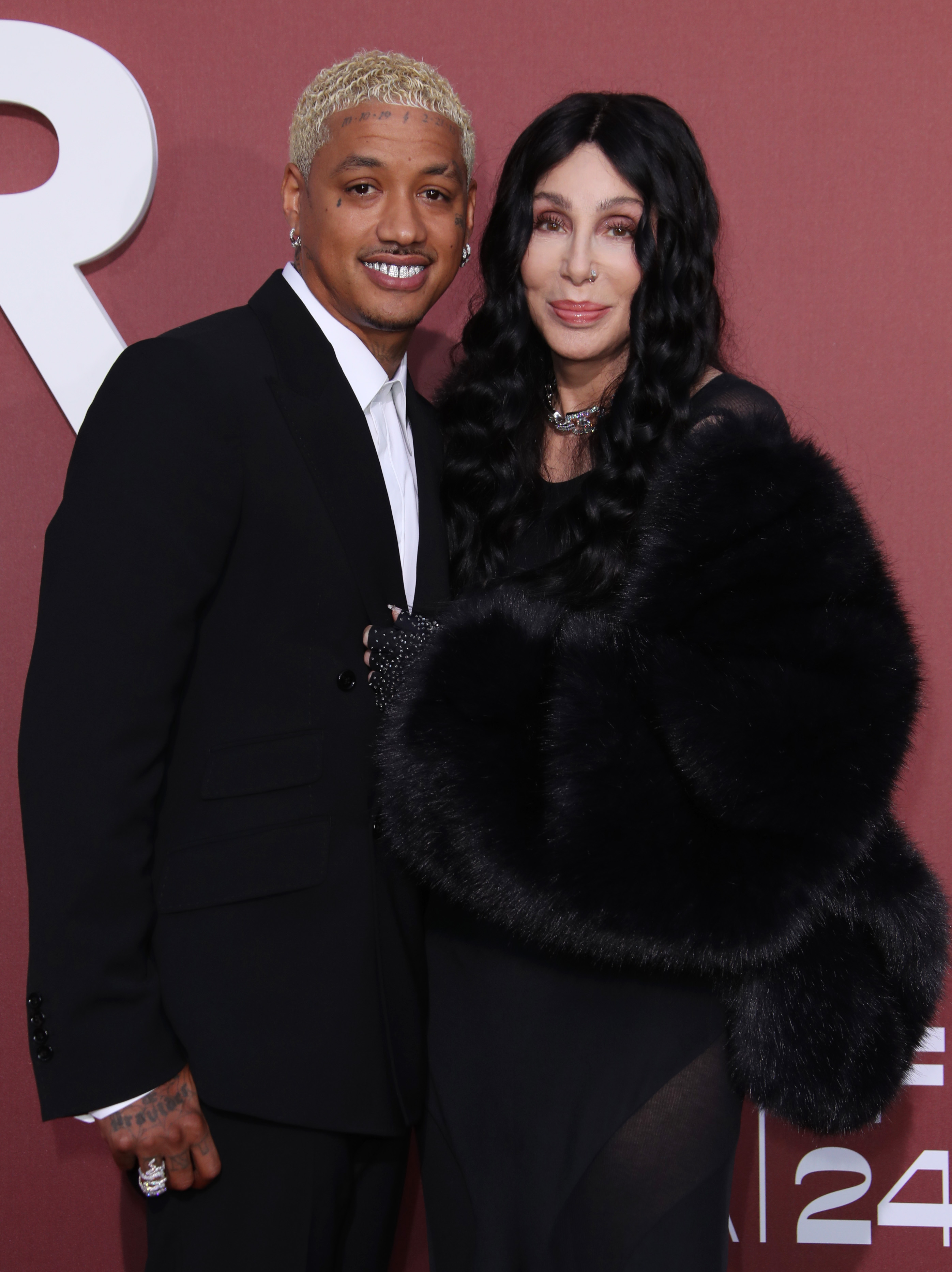 Alexander Edwards and Cher at the 2024 amfAR Cinema Against AIDS Gala.