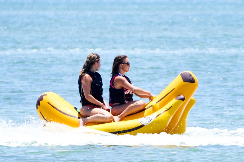 Sydney Sweeney and a friend on a banana boat.