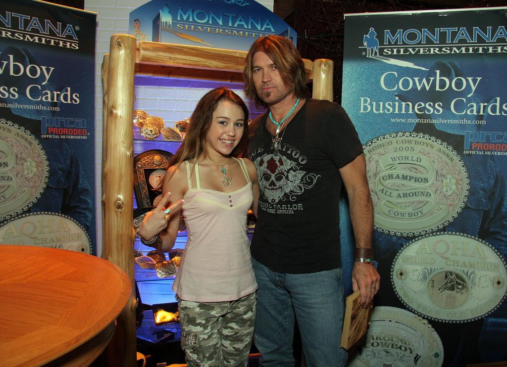 Miley Cyrus with Billy Ray Cyrus in 2006. 