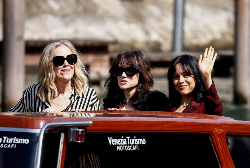 Catherine O'Hara, Jenna Ortega and Winona Ryder in a water taxi in venice