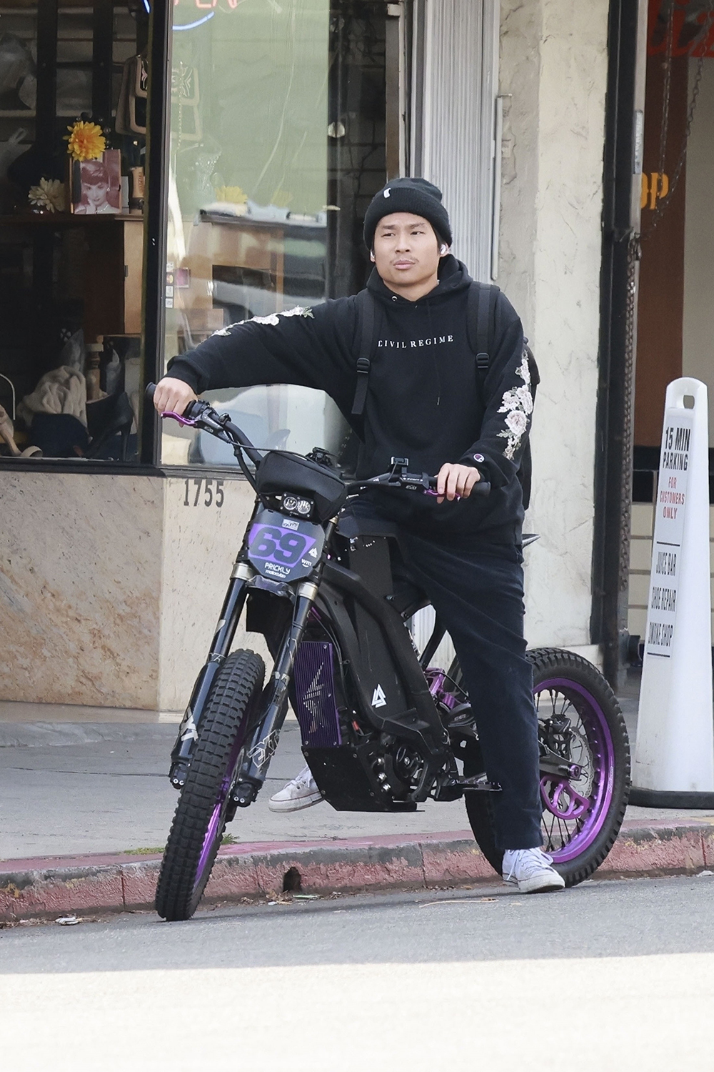 pax jolie-pitt riding an e-bike