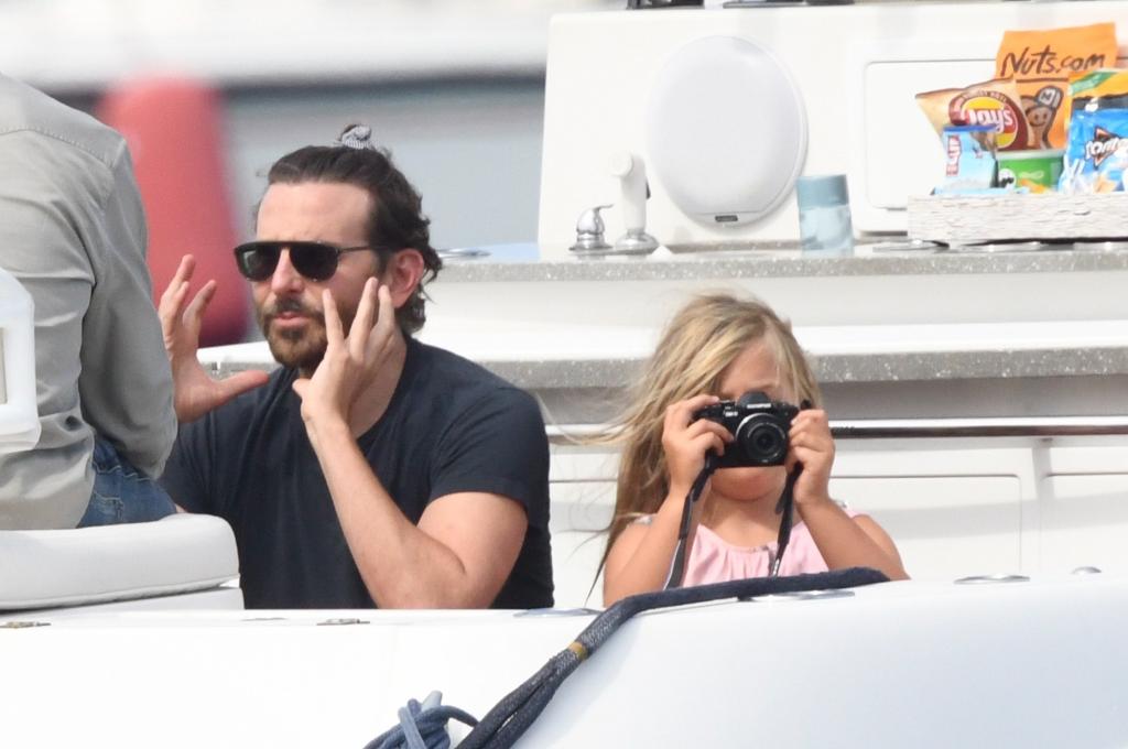 Bradley Cooper and his daughter on a boat in Italy