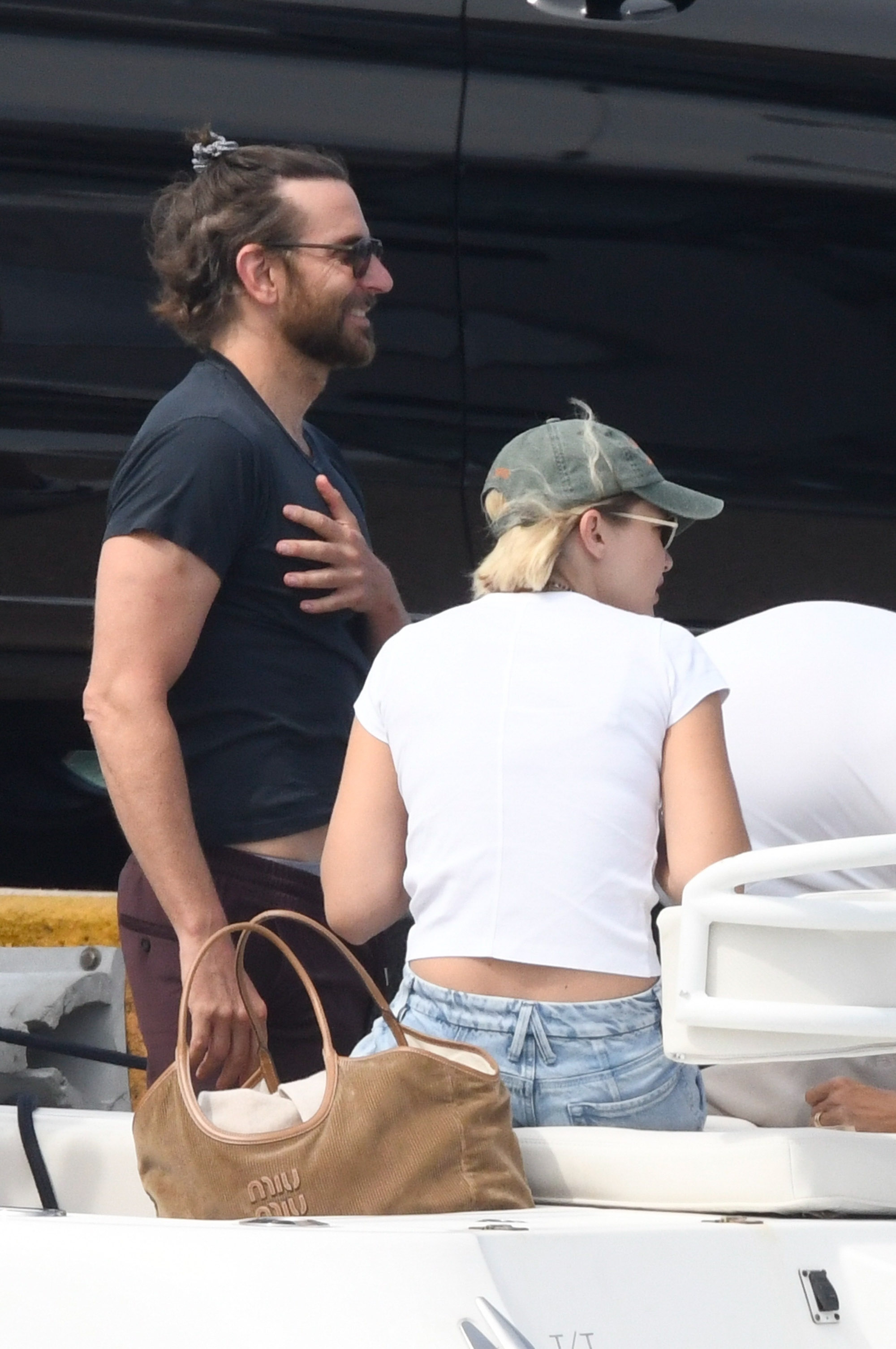 Bradley Cooper and Gigi Hadid on a boat in Italy