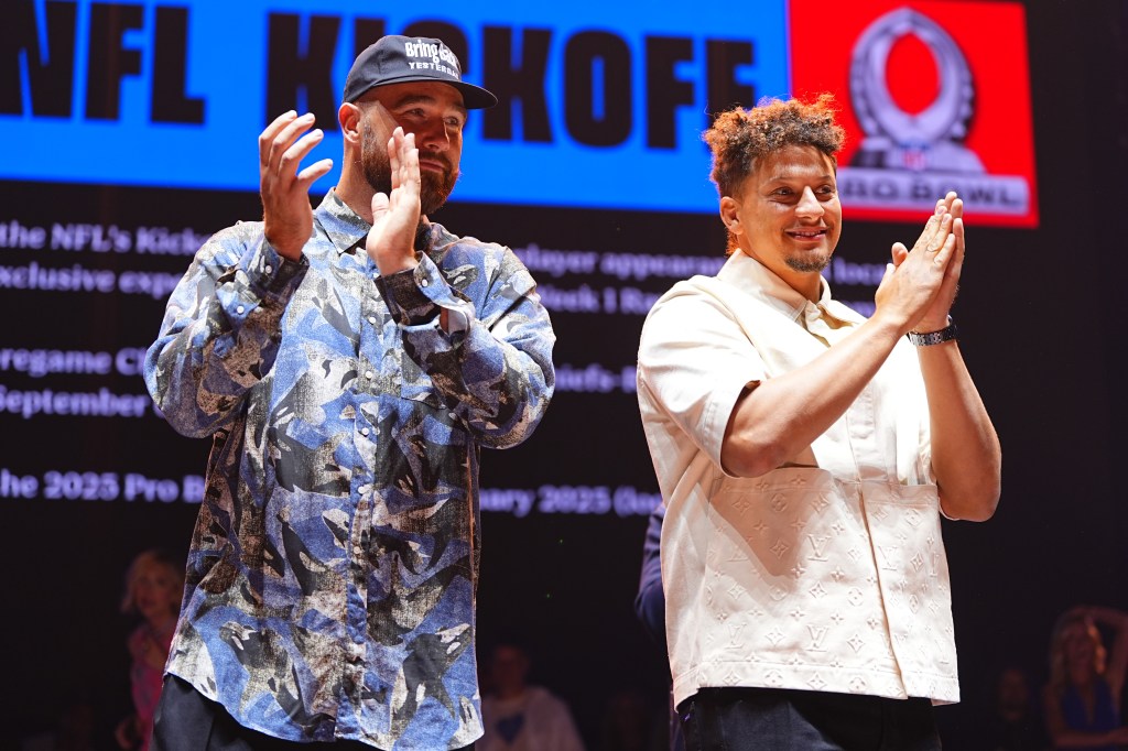 Travis Kelce and Patrick Mahomes stand onstage during 2024 Big Slick Celebrity Weekend on June 01.