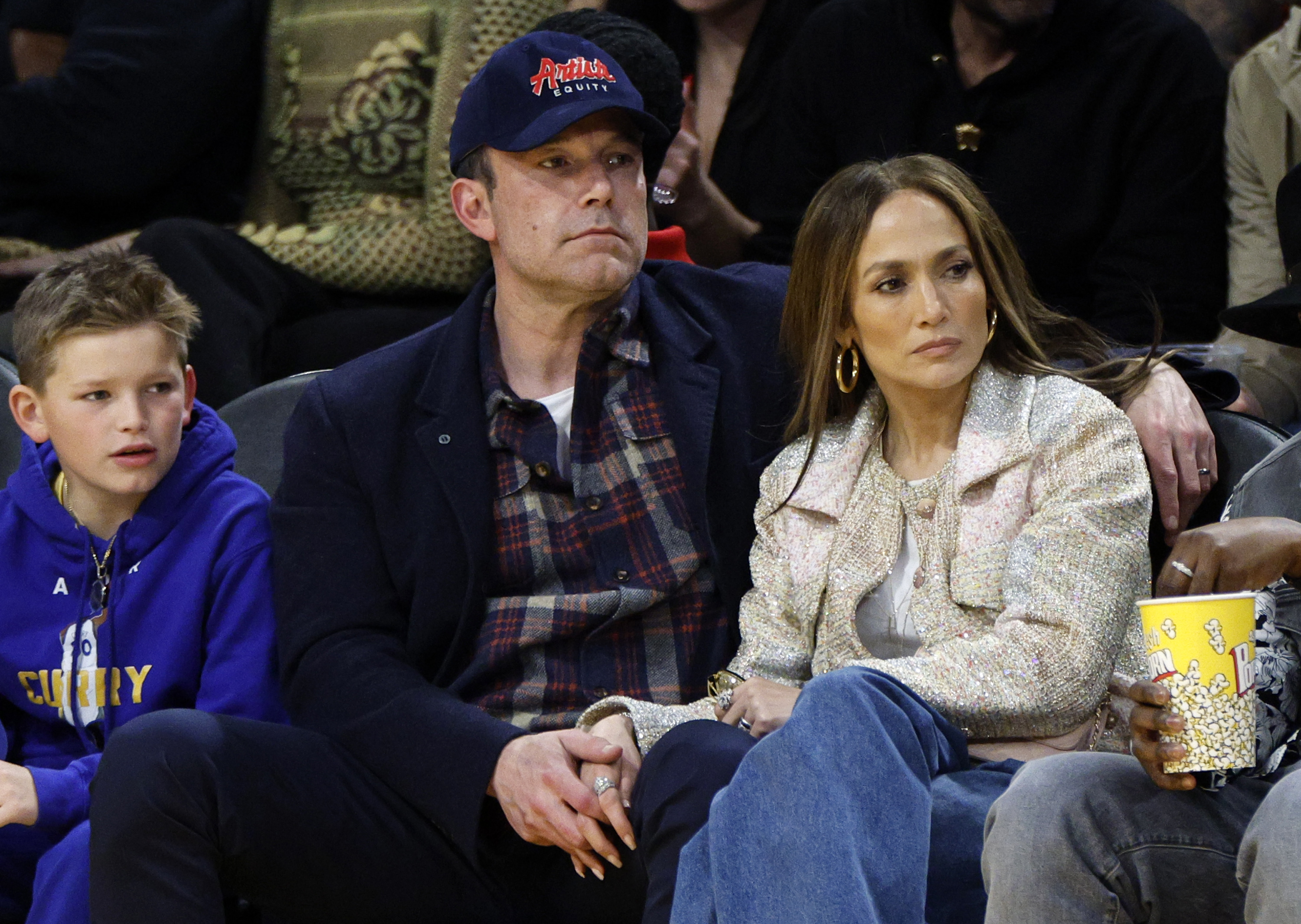 Jennifer Lopez and Ben Affleck sitting together 