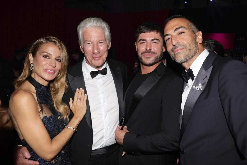 Zac Efron at the amfAR Gala in Venice on Sept. 1, 2024 with Richard Gere, Mohammed Al Turki, and Alejandra Silva. 