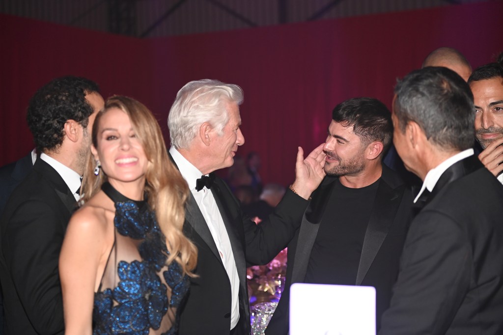 Zac Efron at the amfAR Gala in Venice on Sept. 1, 2024 with Richard Gere and Alejandra Silva. 