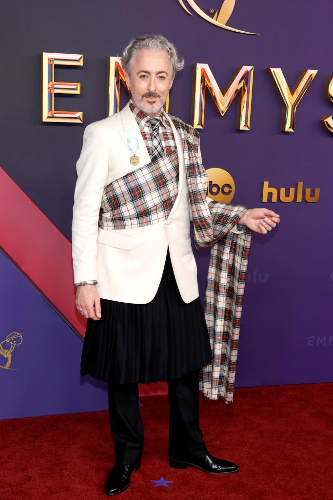 Alan Cumming wears a plaid outfit at the 2024 Emmys