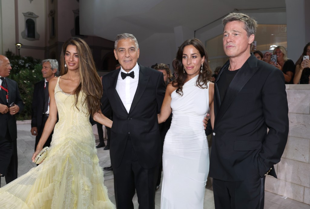  Amal Clooney, George Clooney, Brad Pitt and Ines de Ramon attend the "Wolfs" red carpet during the 81st Venice International Film Festival on September 01, 2024 in Venice, Italy. 