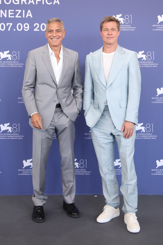 George Clooney and Brad Pitt attend the "Wolfs" photocall during the 81st Venice International Film Festival at Palazzo del Casino on September 01, 2024 in Venice.