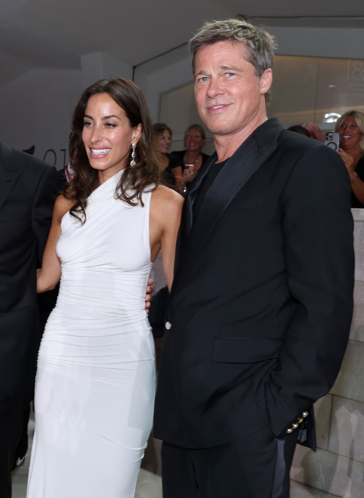  Ines de Ramon and Brad Pitt attend the "Wolfs" red carpet during the 81st Venice International Film Festival on Sept. 01, 2024 in Venice, Italy. 