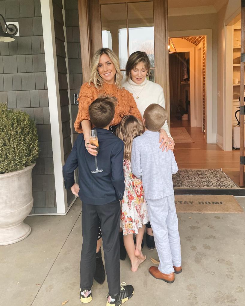 Kristin Cavallari posing with her three kids.