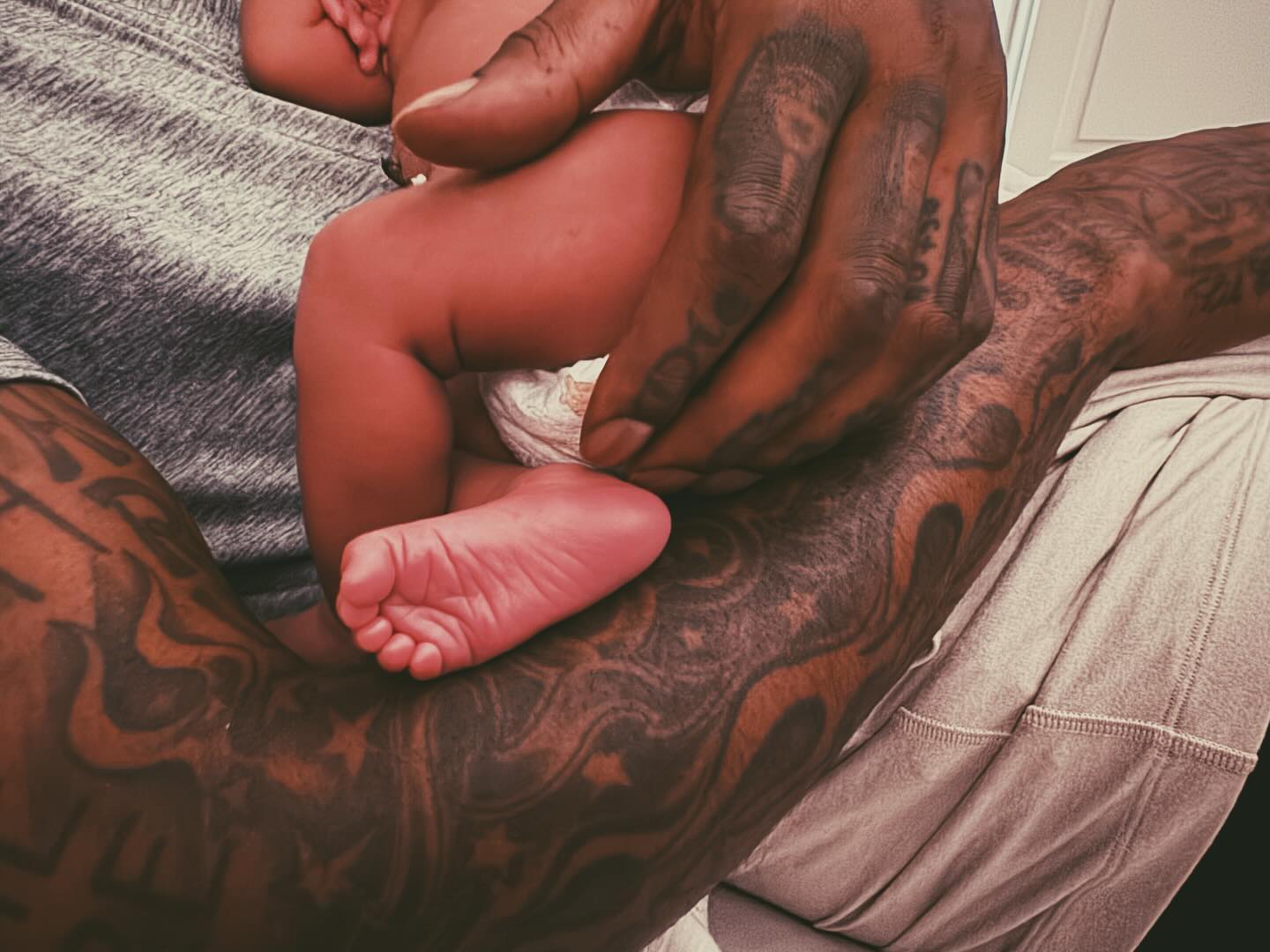 J.R. Smith holding his baby.