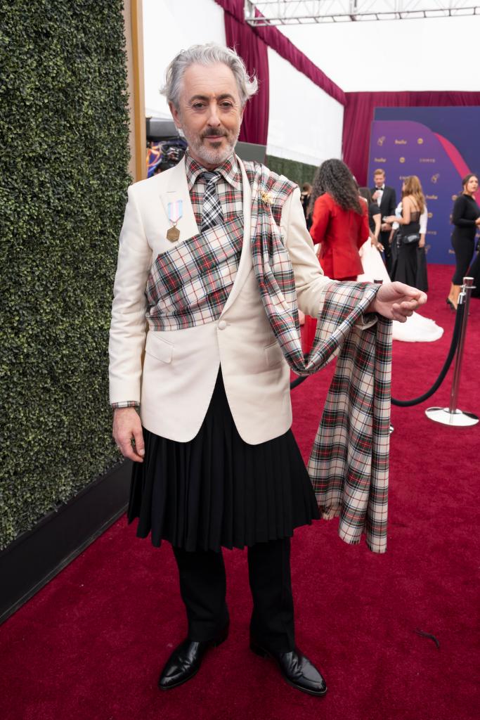 Alan Cumming wears a plaid outfit at the 2024 Emmys