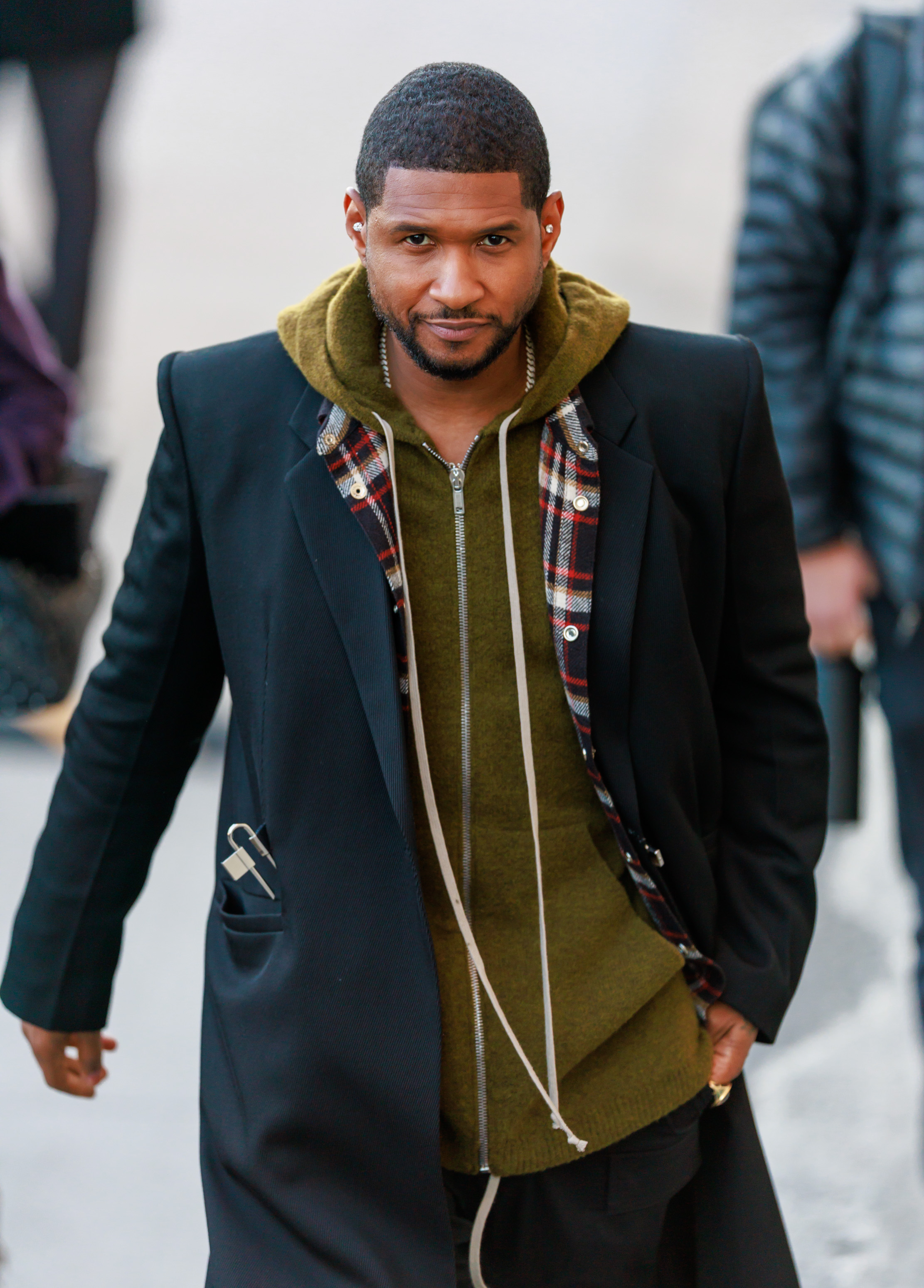 Usher walking outside