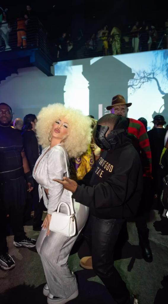 Ray J and Amber Rose and others at a Halloween party.